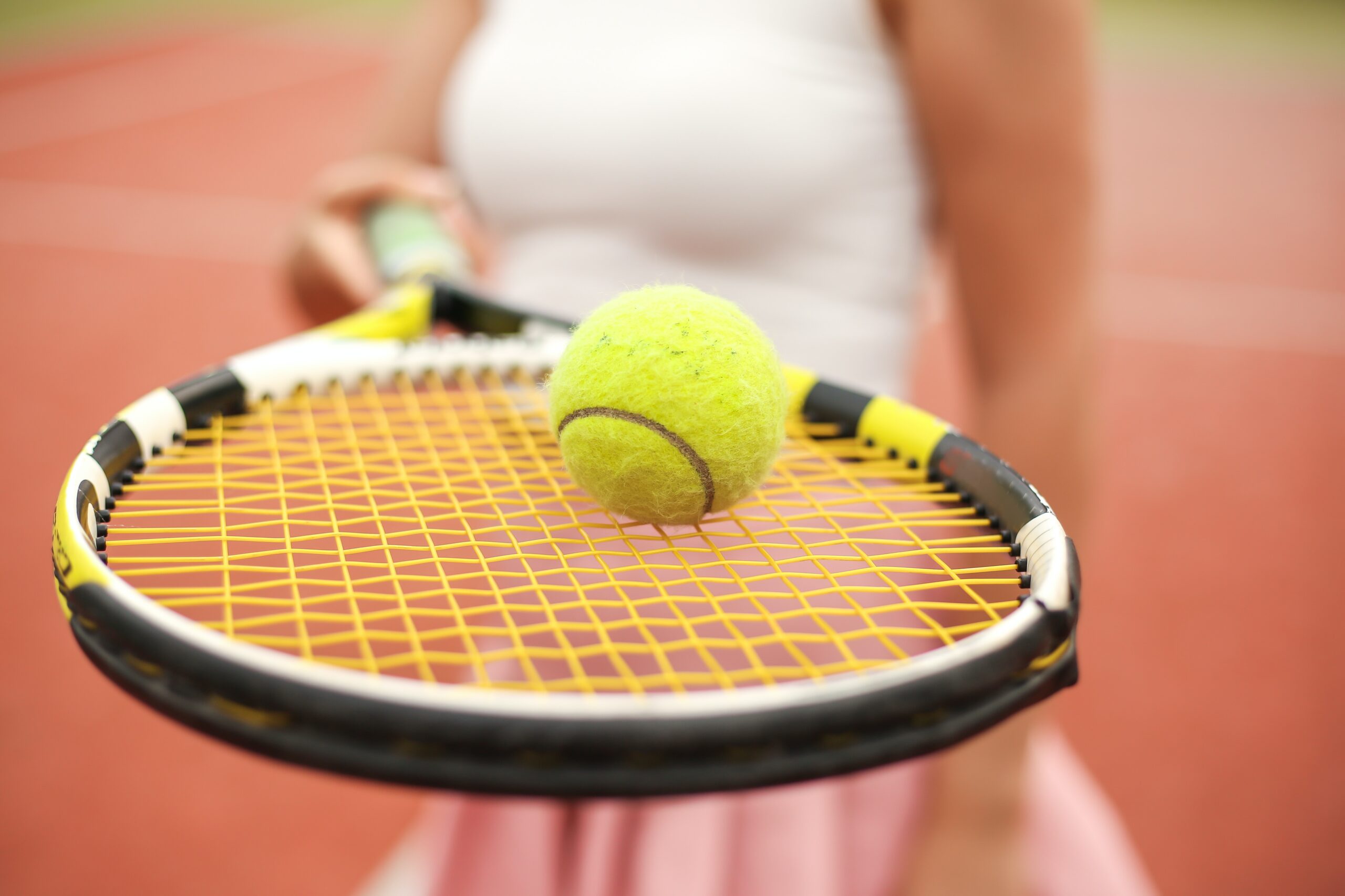 Game, Set, Match! From a Subpar Tennis Lesson to an Improved Business Coaching Approach